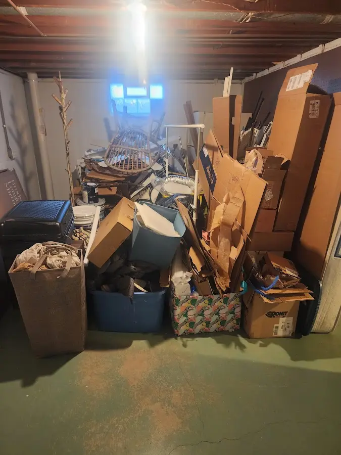 Roll-off dumpster container at job site for Cleanout Dumpster Rental in Shallotte